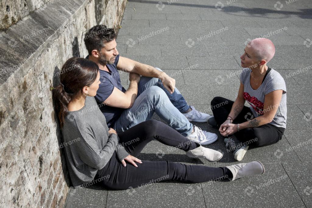 Three People Sitting Outside Talking Mindframe Online Image Collection three-people-sitting-outside-talking-mindframe-online-image-collection