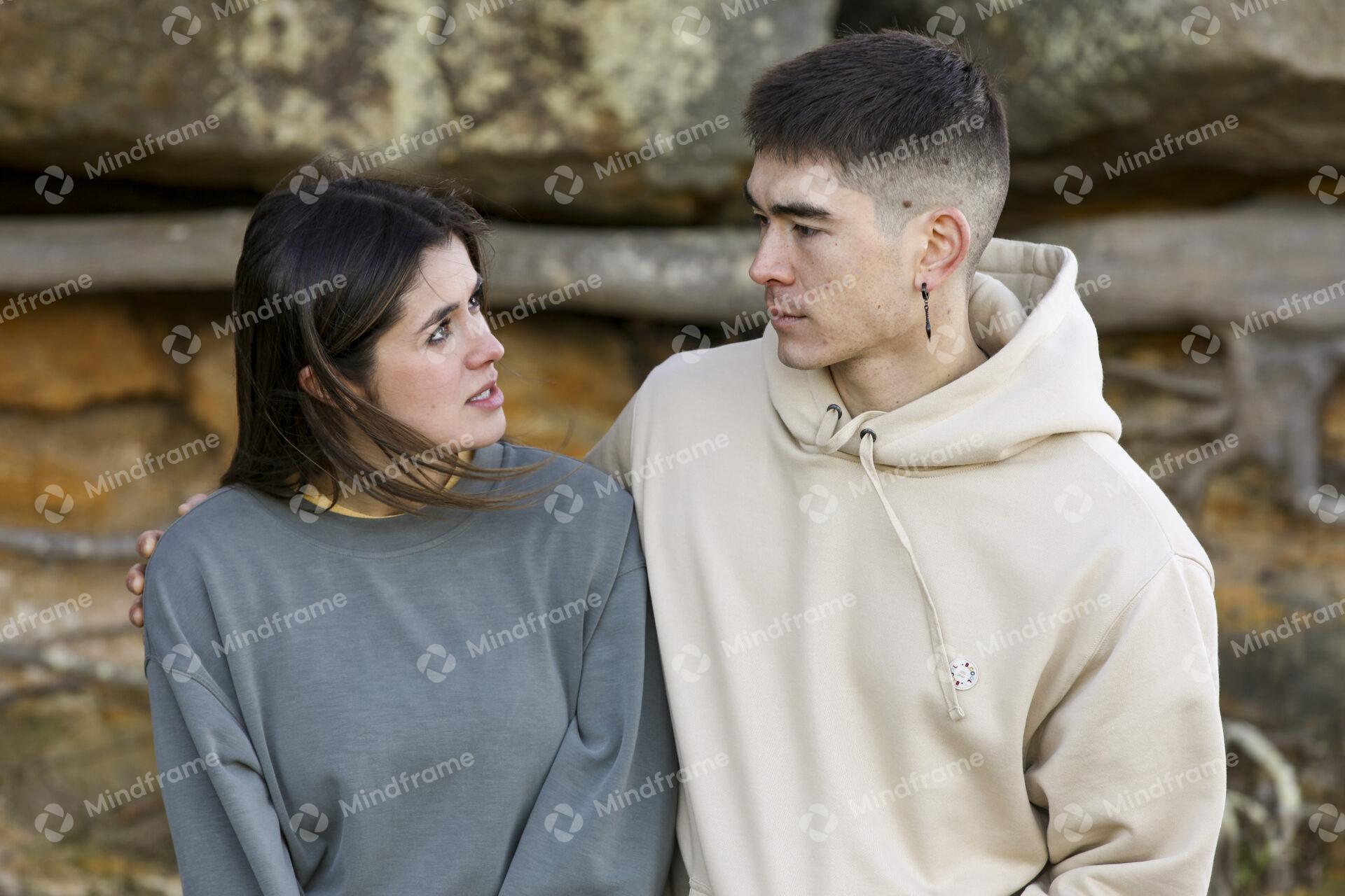 Two people talking and sitting near rocks – Mindframe online image ...