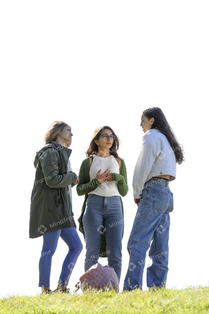 Group of young women standing outside in a park talking – Mindframe ...