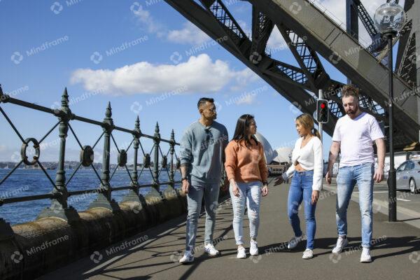 Four people walking on the street