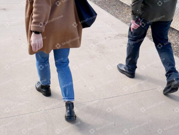 People walking on pavement